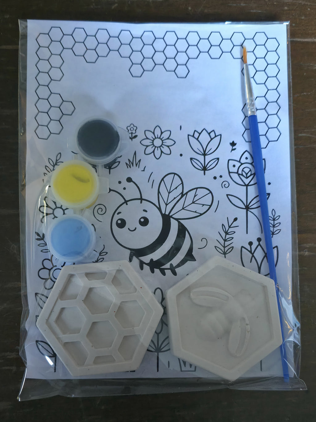 Bee and Honeycomb plaster paint kit with paints, brush, and bee coloring sheet