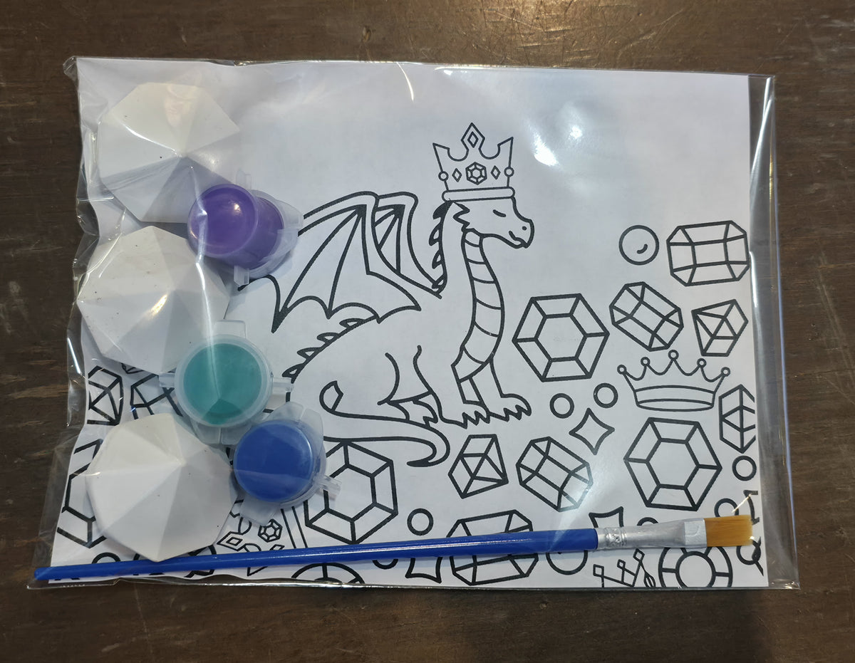 Dragon Gems plaster paint kit with paints, brush, and dragon coloring sheet