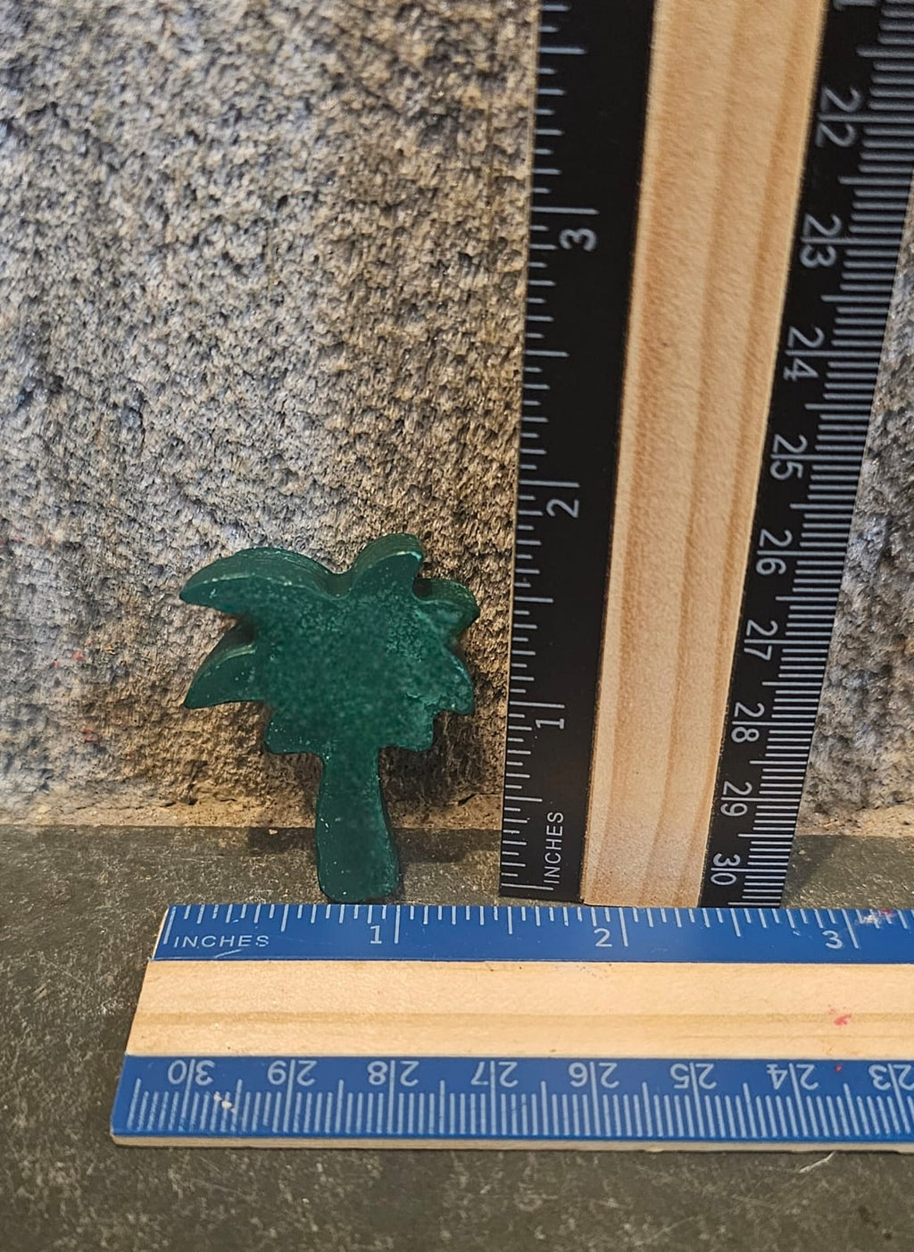 Green palm tree shaped handmade crayon