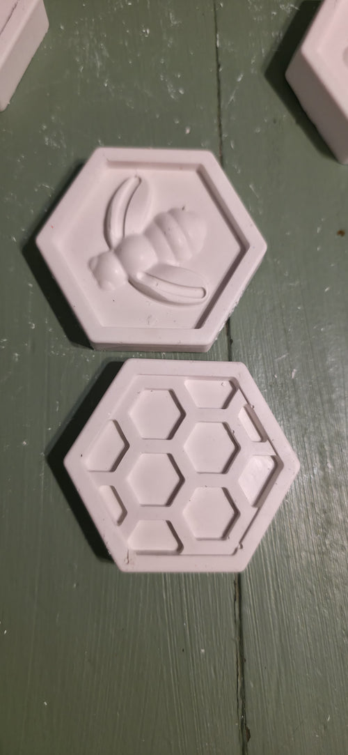 Plaster bee and honeycomb hexagon pieces